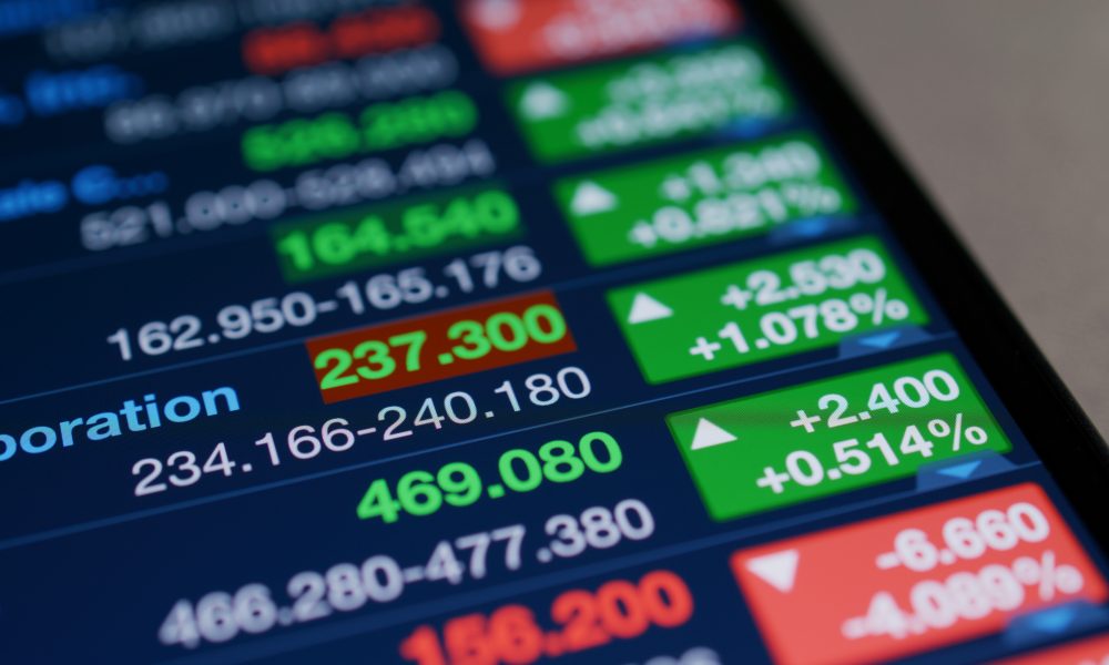 Stock market data shown on tablet computer screen