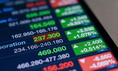 Stock market data shown on tablet computer screen